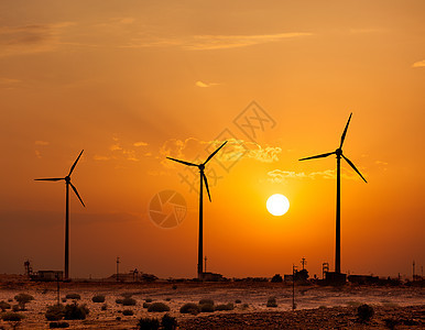 绿色可再生能源风力发电机涡轮机日落图片