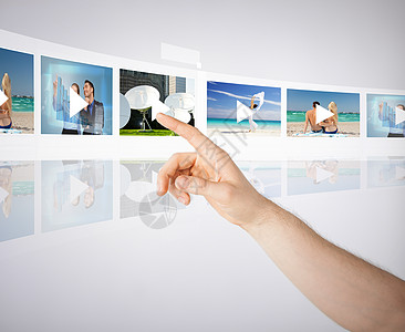技术,互联网,电视虚拟屏幕男人按按钮虚拟屏幕上与视频图片