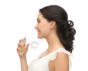 美丽的女人脖子上喷香水的照片图片