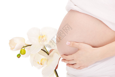美丽孕妇腹部的明亮特写照片图片
