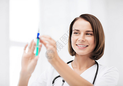保健医疗女医生着注射器注射图片