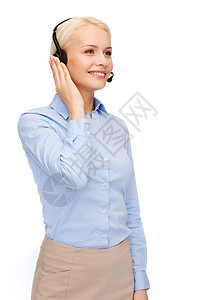 技术呼叫中心友好的女帮助热线运营商与耳机图片