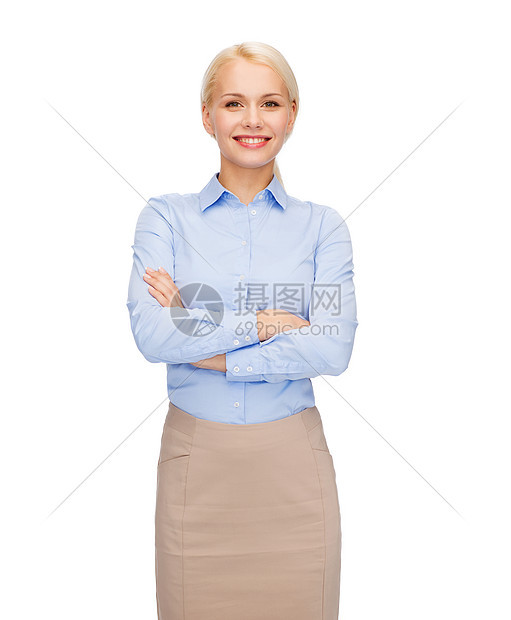 商业教育理念友好的轻微笑的女商人交叉手臂图片