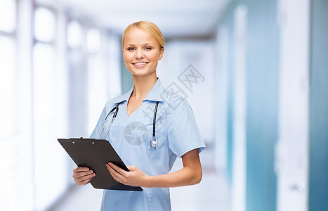 医疗保健医学微笑的女医生护士与听诊器剪贴板图片