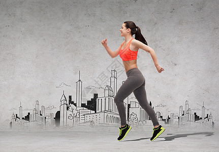 健身,运动,锻炼节食的美丽的运动女人跑城市绘图前图片