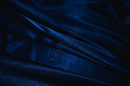 深蓝色丝绸的质地背景图片