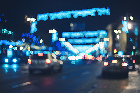 夜晚路夜晚模糊的城市博克夜晚模糊的城市博克美丽的抽象背景与分散的建筑,汽车,城市灯,人五颜六色的背景与城市夜景背景