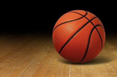 篮球硬木球场地板上,个运动健身的象征,队休闲活动,玩皮球运球传球比赛比赛图片