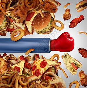 芝士热狗健身饮食斗争的健康的垃圾食品,如汉堡包油炸快餐,被个人用拳击手套打开,抗胆固醇丰富诱惑的象征背景