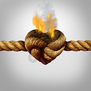 离婚分居的根绳子,个燃烧的结,形状像颗爱的心,夫妻关系问题的象征忠危机的象征图片