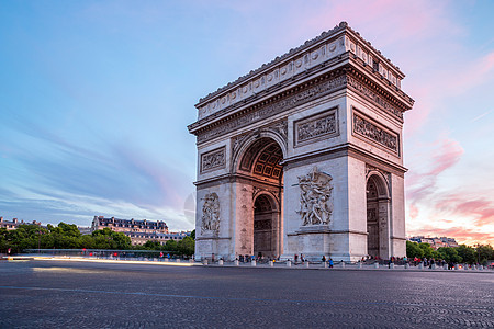 凯旋门的弧形爱丽舍巴黎城日落背景图片