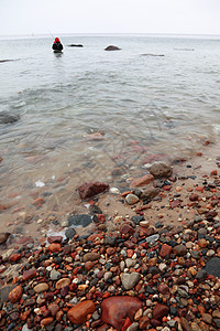 渔夫石头海水图片