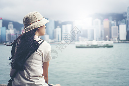 香港湾的亚洲旅行者女图片