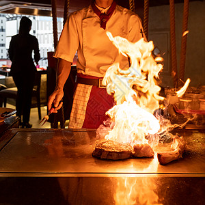 铁板烧厨师烤牛肉铁板烧日本烤牛肉背景