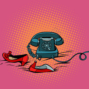 波普艺术旧电话和红色高跟鞋图片
