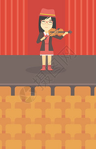音乐厅里演奏古典音乐的小提琴手图片