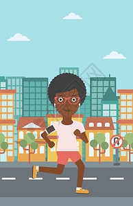 一名跑步时听歌的非裔女子图片