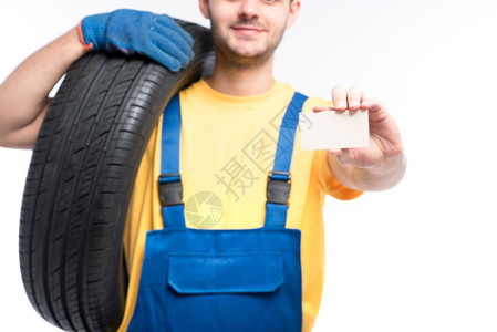 轮胎名片维修轮胎的工人背景