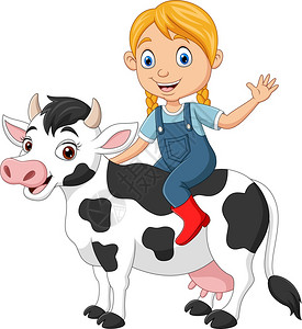 快乐的小女孩骑着奶牛图片