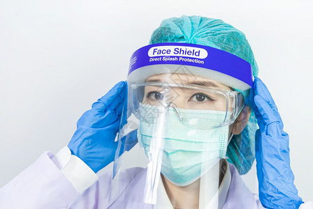 身戴面罩眼镜或护目和防服的科学家医生图片