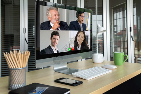在虚拟工作场所或远程办公室召开商业人员会议利用智能视频技术进行远程工作电话会议与专业公司务的同事进行联系呼叫高清图片素材