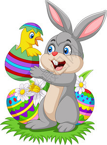 卡通兔子抱着一只从蛋孵出来的小鸡图片