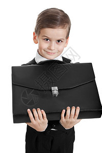 男孩拿着公文包孤立在白色背景上图片