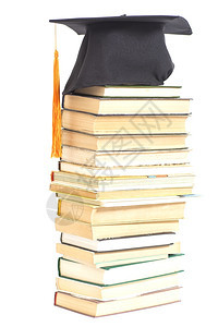毕业帽子白孤立的书籍图片