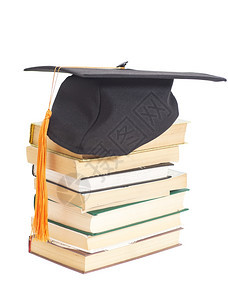 毕业帽子白孤立的书籍图片