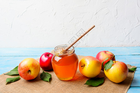 新年符号jewsh新年符号装有顶和苹果的玻璃蜂蜜罐图片