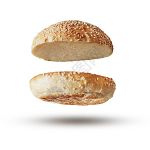 无填料的烤汉堡包顶部飞行在白色上浮图片