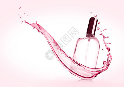 粉红色香水瓶背景喷洒图片