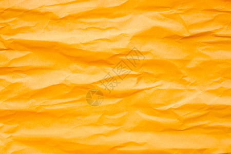 褐色橙折叠纸作为背景背景图片