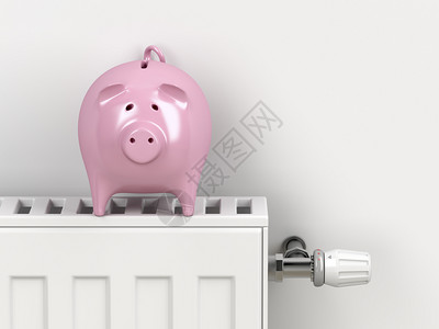 中央暖气散热器的猪库概念图像节省取暖的钱背景图片