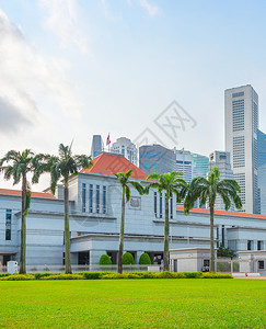 城市草坪由绿草背景的现代城市风背景