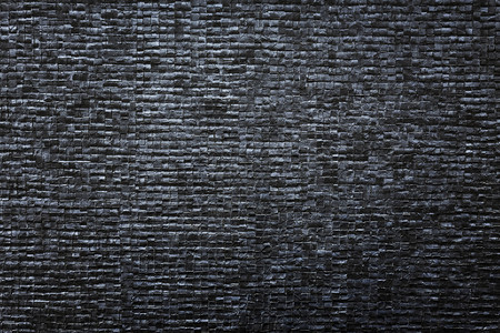 壁中黑砖模式的抽象背景旧图片