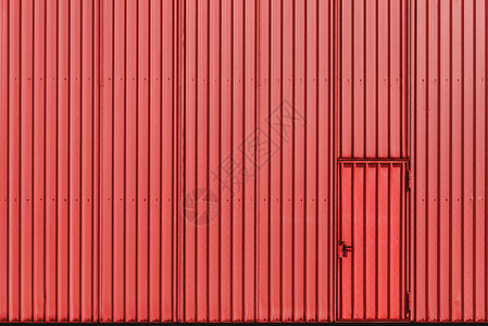 珊瑚色金属板墙和门的仓库外铝板工业和门大楼的金属门图片