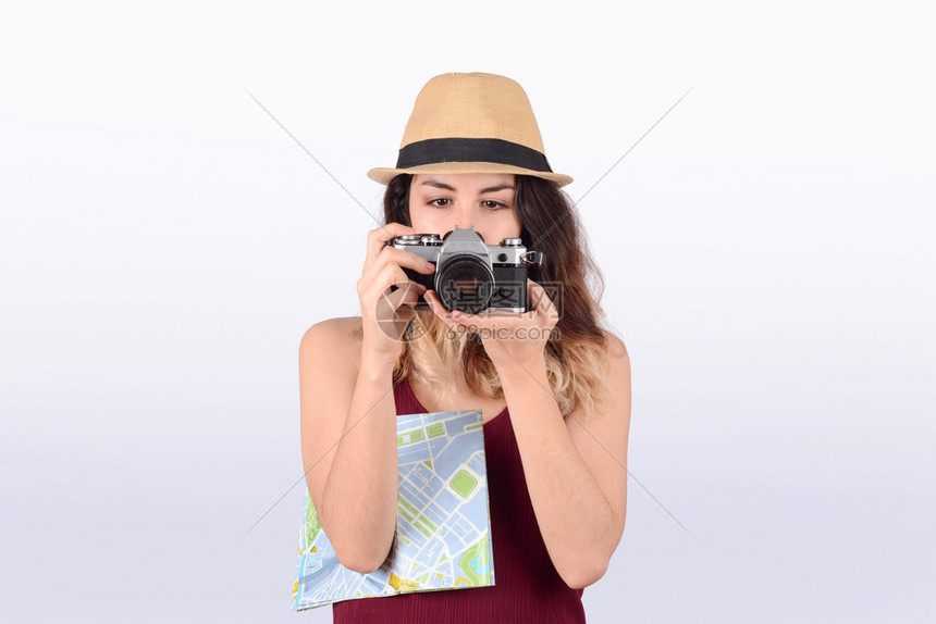 旅游观光女肖像与旧相机旅行概念图片