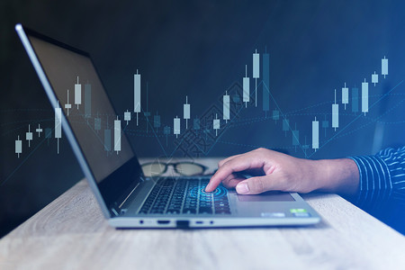 商业用关于笔记本电脑屏幕财务数据和技术概念的股票市场金融指数分析统计图表背景图片
