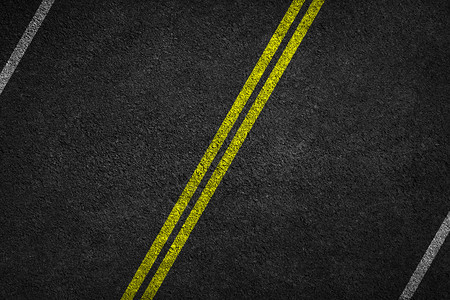 两条黄线的道路标记背景图片
