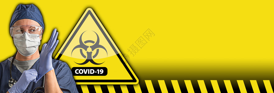 身着防护设备和cornacvid19的医生或护士身着保设备后有生物危险警告标志图片