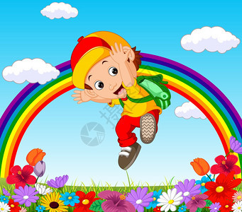 可爱的男孩在花园彩虹下图片