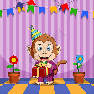 猴子拿着一个红色的礼物庆祝他的生日图片