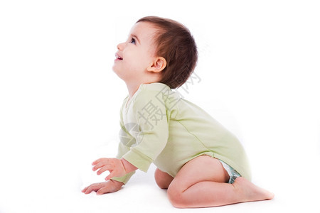 婴儿的侧面姿势坐在白色背景下仰望着婴儿图片