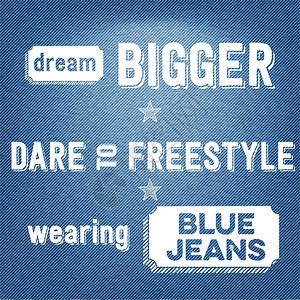 梦想更大敢于自由式穿着蓝色牛仔裤背景图片