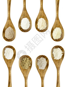 免费面粉杏仁椰子麻棕米quinoaTeff马铃薯小麦带复制空间的孤立木勺最高视图图片