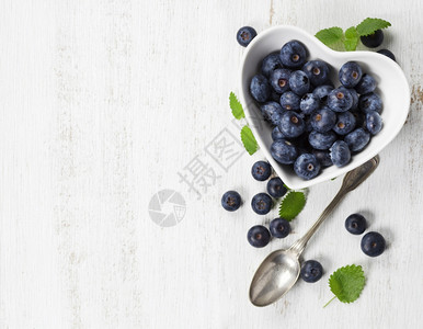 Muesli健康早餐带酸奶的浆果和白底种子健康食品饮脱毒清洁饮食或蔬菜概念图片
