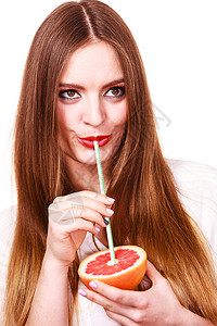 女拥有水果汁的葡萄女有吸引力的长发女孩有色眼睛化妆持有水果汁的葡萄健康饮食品暑假概念图片