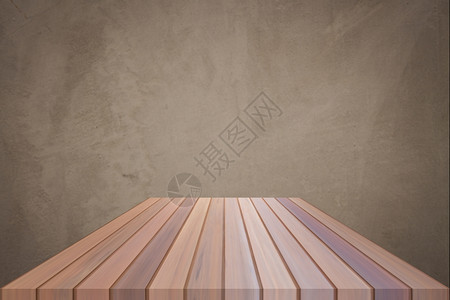 含混凝土壁背景的空棕色顶层木制桌用于产品显示图片