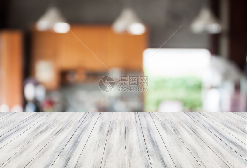 摘要模糊了咖啡厅背景上面有白色空桌顶用于产品显示图片